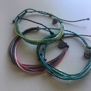 Three Puravida bracelets